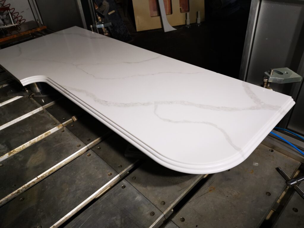 Calacatte quartz custom dining table, CNC cut and polished, Nulty Providers